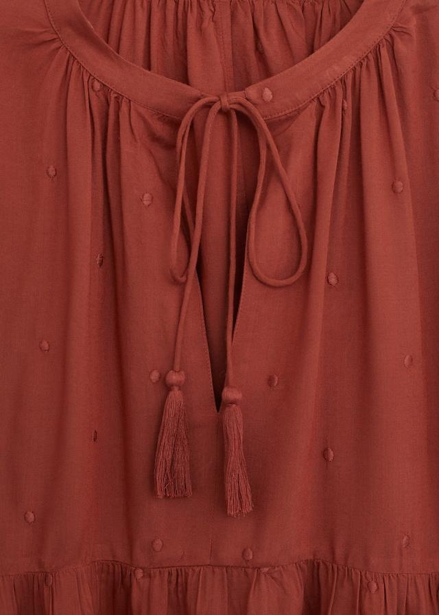 Relief details blouse