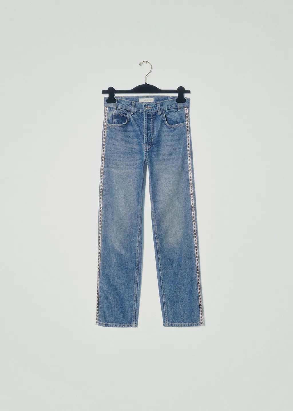 Straight jeans with crystal detail on the sides