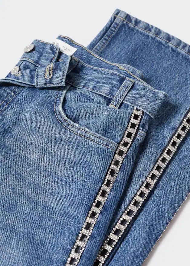 Straight jeans with crystal detail on the sides