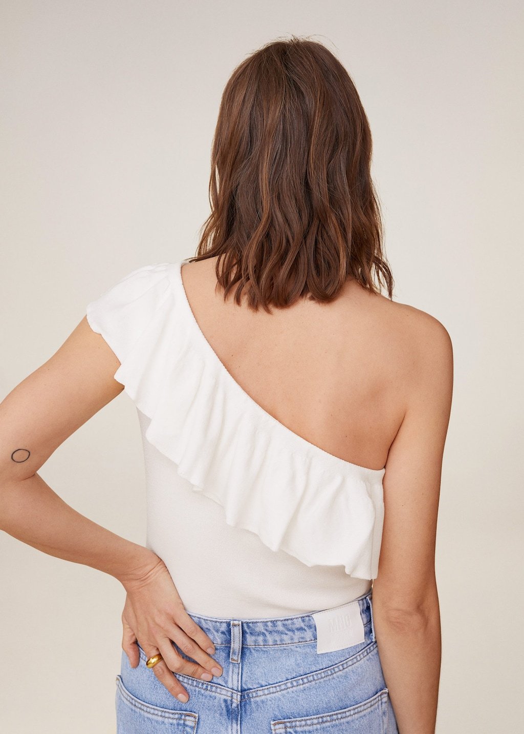 Asymmetric flounces top