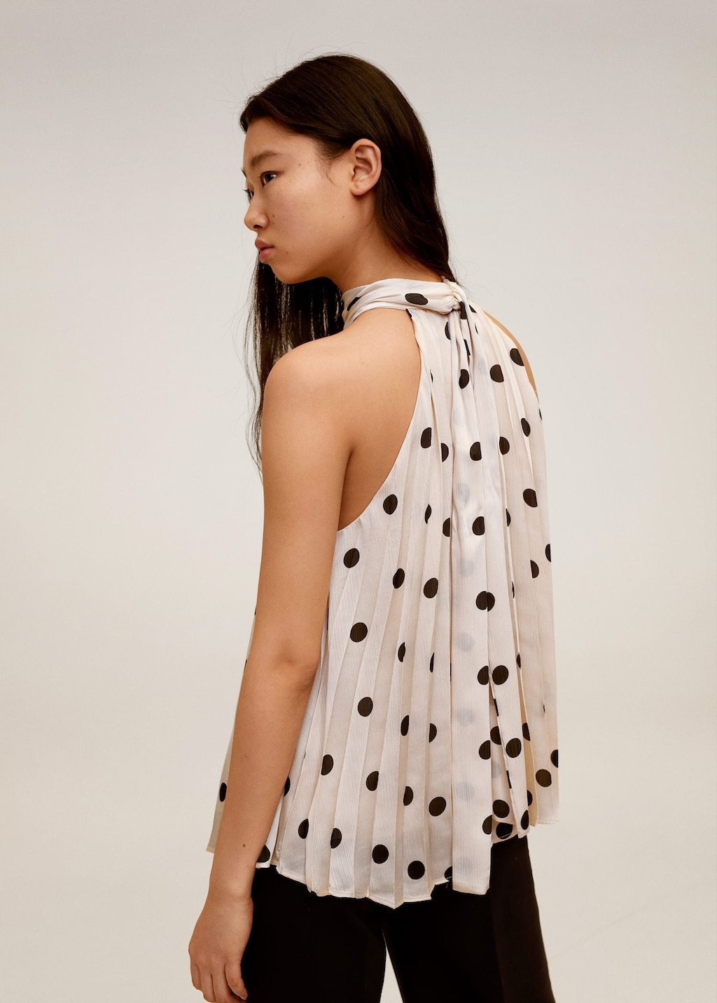 Polka-dot pleated top