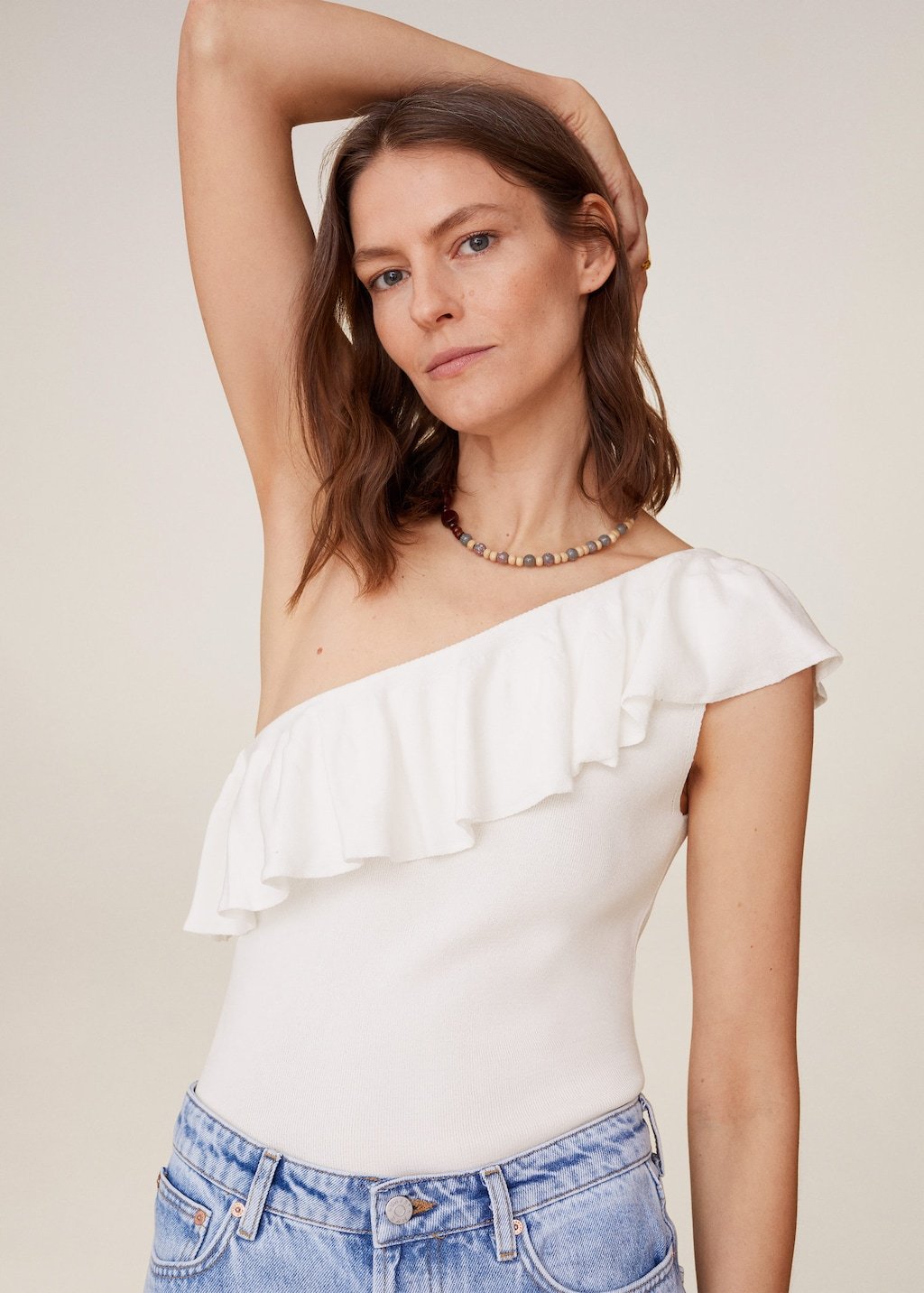 Asymmetric flounces top