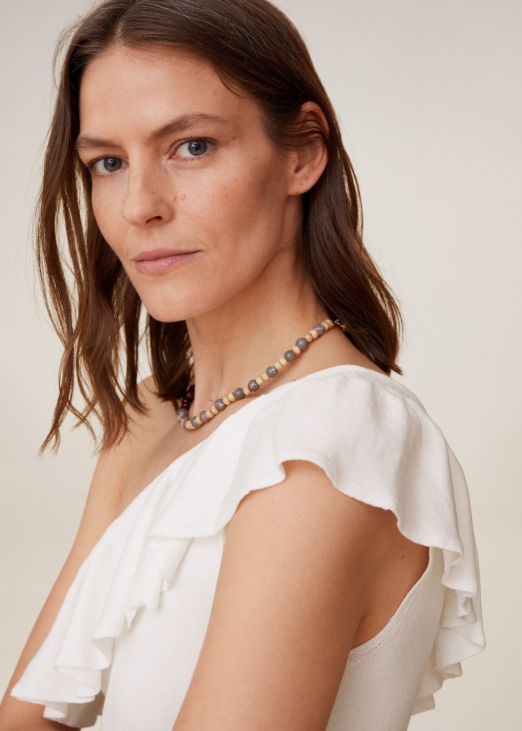 Asymmetric flounces top